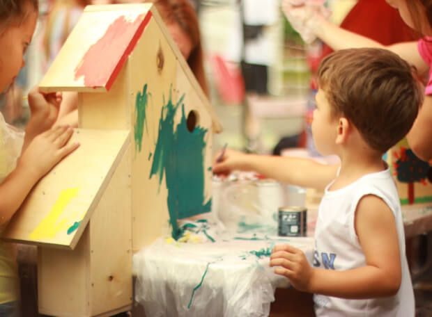A child coloring at Evikindervilla Nursery in Maadi, Cairo, Egypt. The nursery offers a creative environment for young children to explore and express themselves through art.